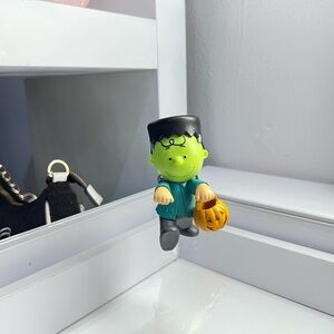 Green Frankenstein Figurine with Pumpkin